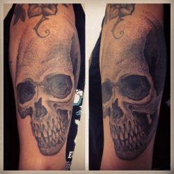 Gregorio Marangoni gives this human skull tattoo an interesting texture by using thousands of tiny dots