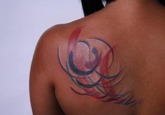 Swirls of paint become an artistic tattoo design in this body art work by Amanda Wachob