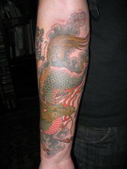 Tattoo artist Hide Ichibay uses his perfectionist tendencies to give this tattoo of a dragon horse intricate patterns