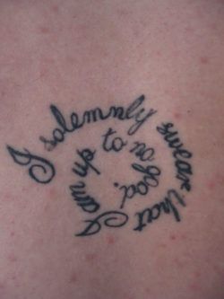 A Harry Potter fan tattoo that has the naughty phrase I solemnly swear that I am up to no good