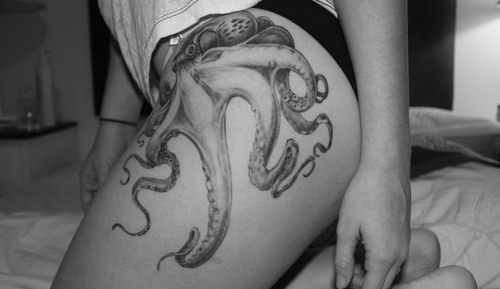 A sexy placement gives this octopus tattoo design a sensual, seductive appeal