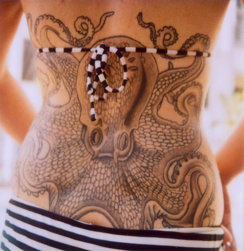This detailed black and white octopus tattoo makes for an interestin oceanic body art work