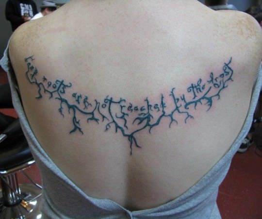 This literary tattoo shows a quote from fantasy novelist JRR Tolkien in a whimsical, elvish font