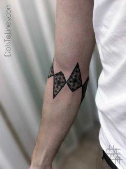 Geometric patterns and mandala designs merge in this armand tattoo by Chaim Machlev