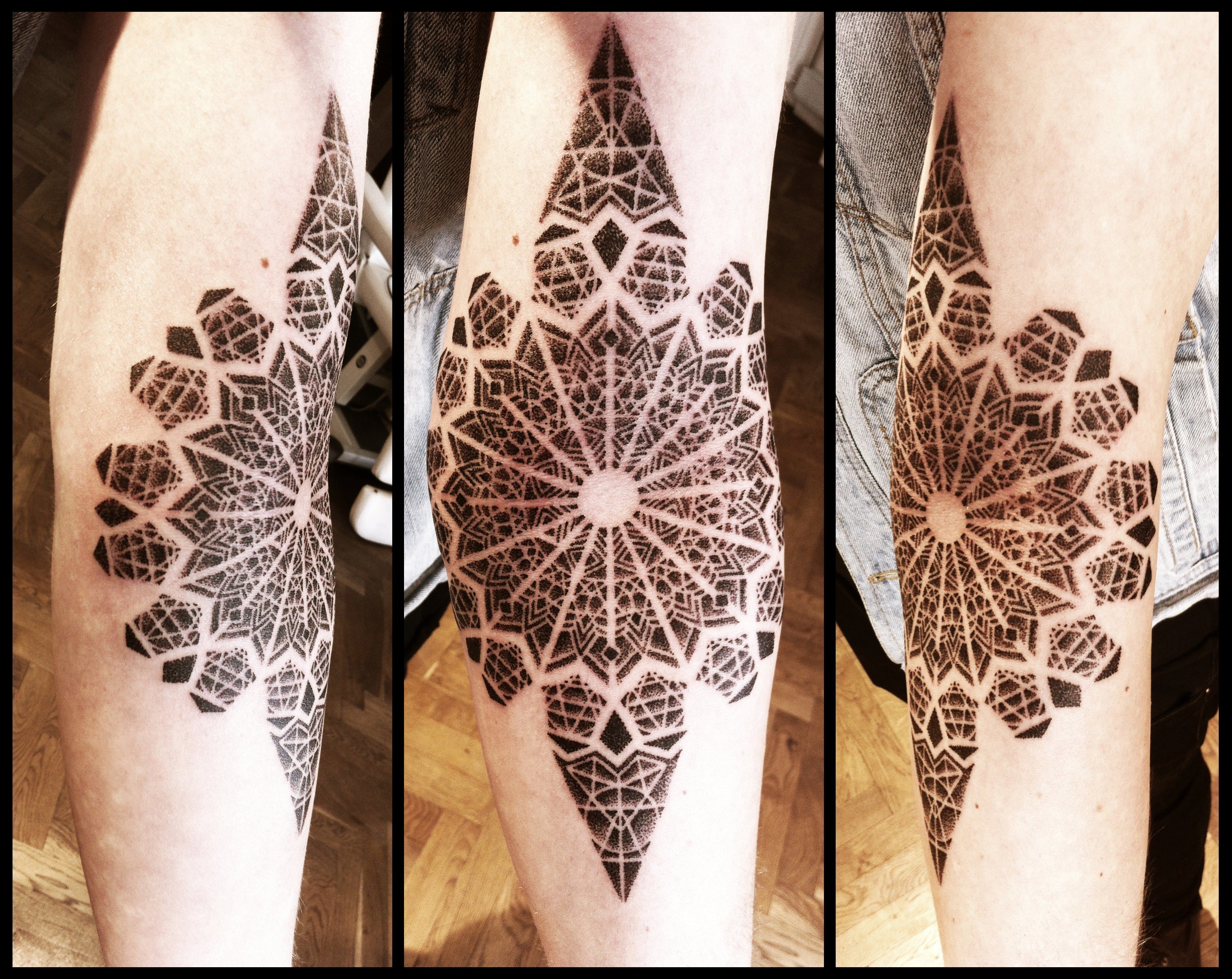 Peter Madsen uses a dotwork technique and fine detail to create a lacy, feminine mandala tattoo
