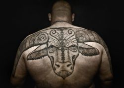 This incredible tattoo of a bull across the shoulders shows off Peter Madsen's unique style and talent