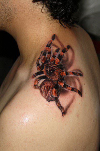 Using shadows, Carlox Angarita has given this photo realistic tattoo of a tarantula a 3D effect