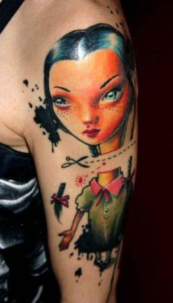 A surrealist dolly has her head cut off in this photo realistic cartoon tattoo by Nadelwerk