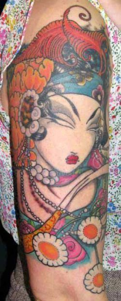 East meets west in this geisha tattoo by Venus Flytrap that combines art styles and fashions to express femininity