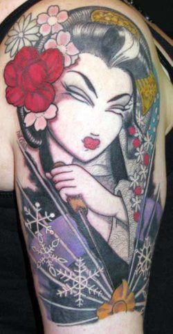 Flowers and snowflakes add to the meaning of this geisha tattoo by Venus Flytrap