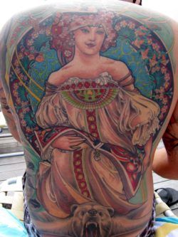 The bright colors and intricate details of Art Deco tattoos are appealing up close and from a distance