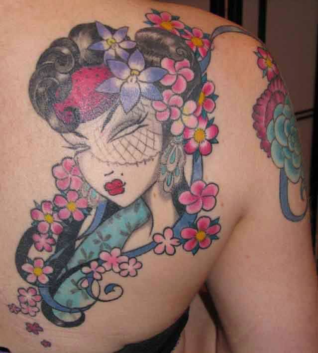This geisha tattoo by Venus Flytrap combines art styles and fashion from different periods in time