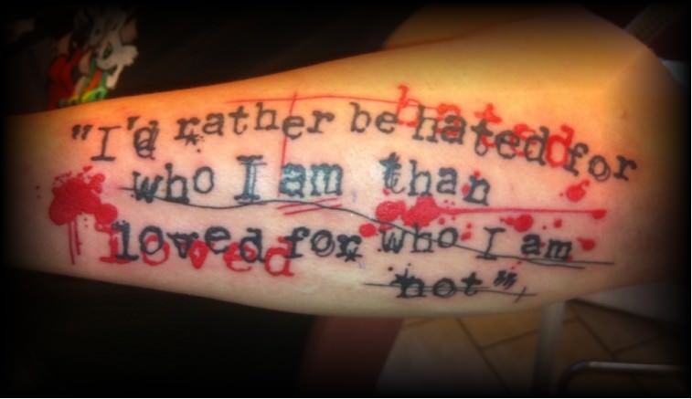 This typography tattoo is a statement about being ourself instead of pretending to be someone you are not
