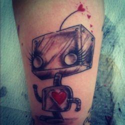 A cute little robot girl comes to life in this artistic tattoo design by tattoo artist Mel Wink