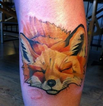 Hungarian tattoo artist Csiga creates a peaceful and artistic animal portrait of a fox in this nature tattoo