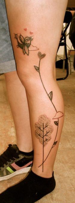 This abstract nature tattoo by French artist Noon porrtays a bird and trees in his signature Avante Garde style