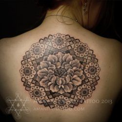 Mike Amanita builds a flower of life mandala around this peony blossom in this spiritual sacred geometry tattoo