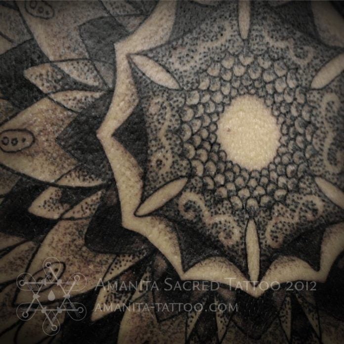 This close up of a mandala tattoo by Mike Amanita reveals how he creates shade and texture with tiny dots