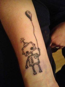 Joshua Kahl's robot tattoo symbolizes innocence and love with its balloon and heart symbols