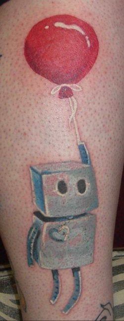K Turner tattooed herself with this cute robot design that has a heart and flies with the help of a red helium balloon