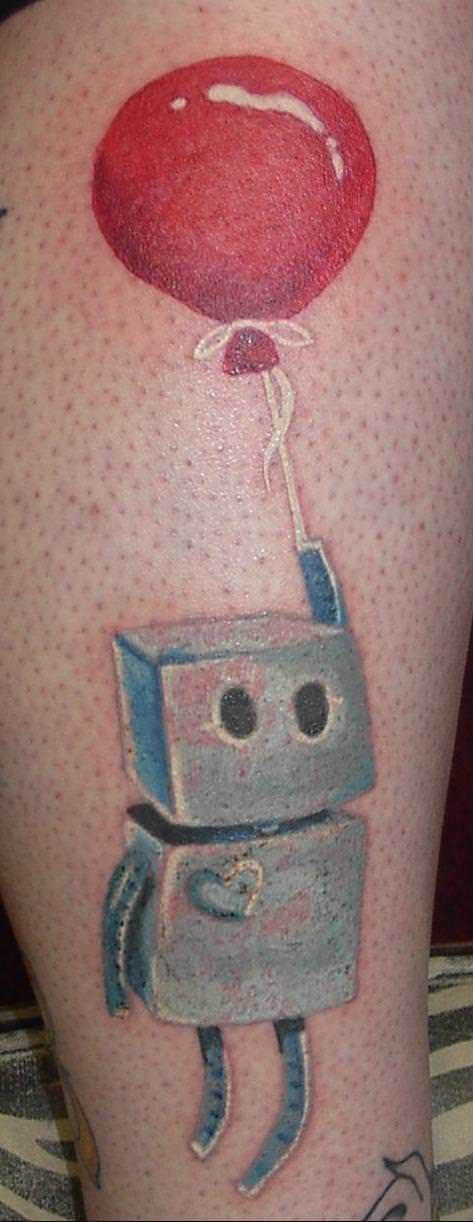 K Turner tattooed herself with this cute robot design that has a heart and flies with the help of a red helium balloon