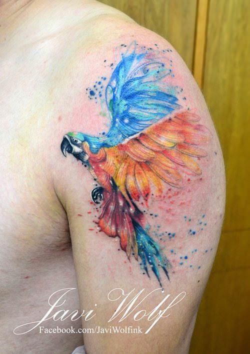 A colorful parrot is the subject of this stunning animal tattoo by Javi Wolf