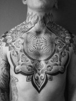 Italian tattoo artist Deliperi has used radial lines to create the illusion that this man has holes in his chest
