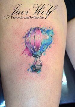 This cute but meaningful tattoo of a hot air balloon by Javi Wolf is eye catching and appealing