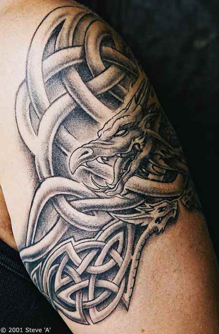 A dragon is tied up in a celtic knot in this tattoo design that celebrates Irish family heritage