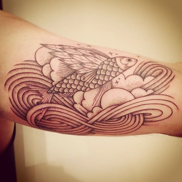 A flying fish is surrounded by flowing lines which are a signature of the style used by tattoo and street artist Supakitch