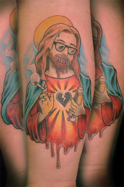 A vampire Jesus smokes and drinks alchohol in this anarchist anti-religion tattoo by Cavan Infante