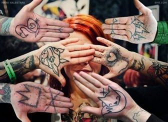 Clients show off their fun and funky palm tattoos by German tattoo artist Mark Halbstark