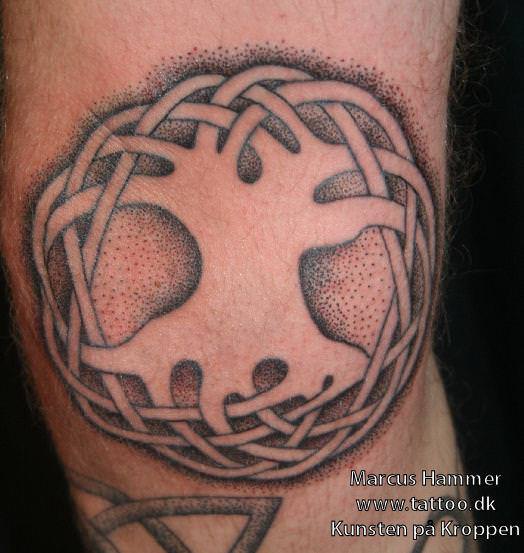 Marcus Hammer from Art on the Body tattoo studio creates a celtic knot tree of life