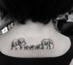 A mother elephant leads her young in this neck tattoo that symbolizes loyalty, motherhood and leadership
