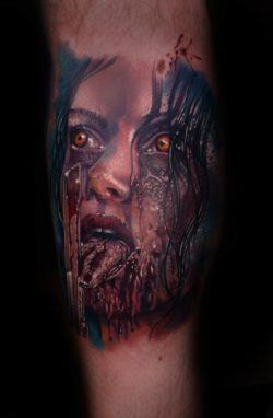 A zombie girl drools over your flesh and blood in this gory horror tattoo by Mario Hartmann