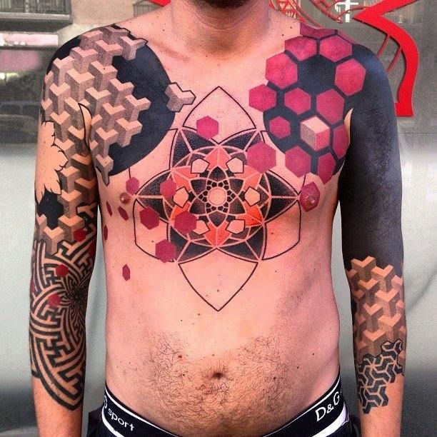 Geometry, optical illusions and mandalas make up this modern tribal tattoo by Marco Galdo