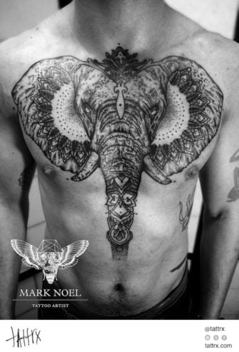 Mark Noel uses a dotwork tattoo style to create this paisley elephant chest tattoo
