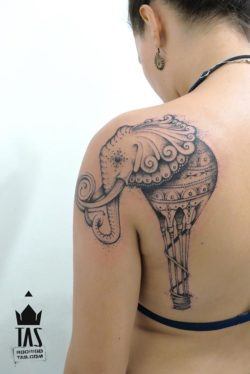 Tattoo artist Rodrigo Tas turns an elephant into a hot air balloon in this creative dotwork tattoo