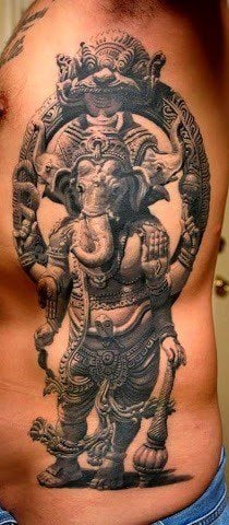 The Hindu god Ganesh holds a club of war in this black ink tattoo