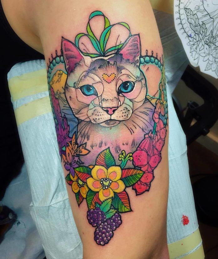 A pet lover asked tattoo artist Katie Shocrylas to turn a photo of her beloved cat into a beloved tattoo