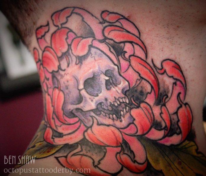 A skull emergeA skull emerges from a colorful flower in this tattoo by Ben Shaw that celebrates life and death.s from a colorful flower in this tattoo by Ben Shaw tha celebrated life and death.