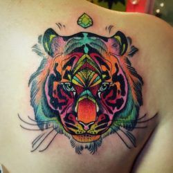 Katie Shocrylas uses UV tattoo inks to make this tiger tattoo stand proud