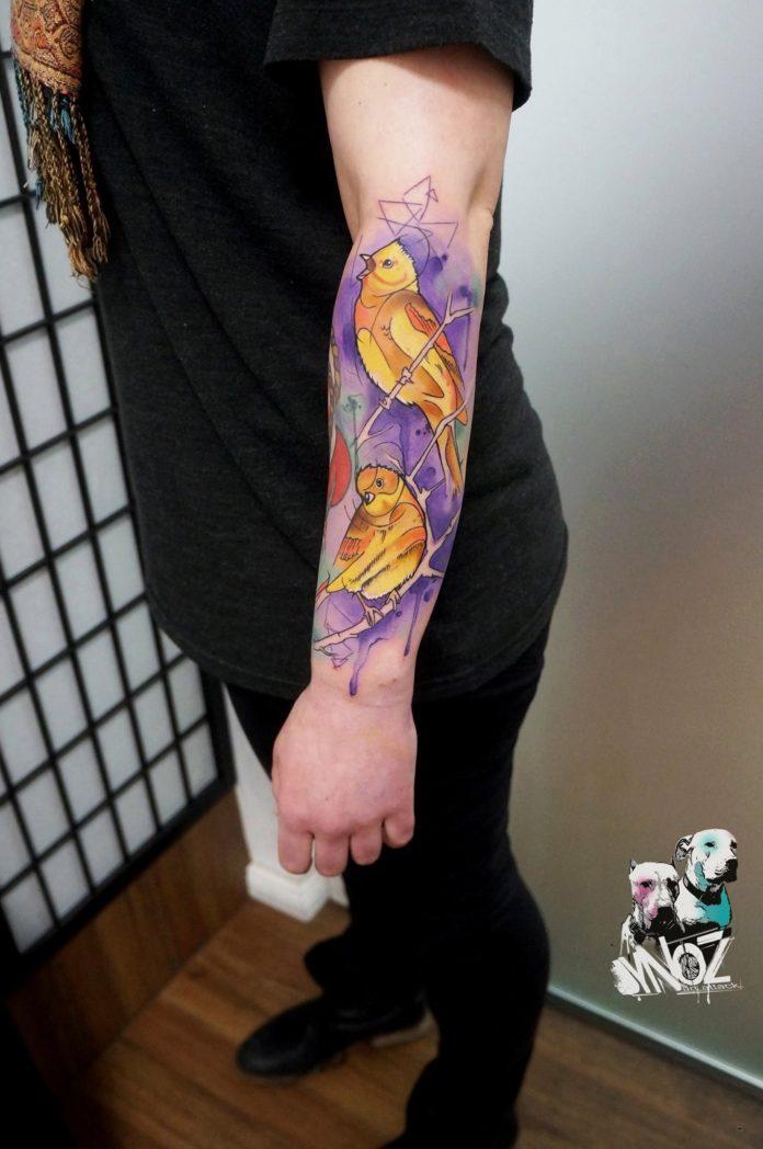 This canary bird tattoo is an excellent example of Dynoz's use of color tattoo inks