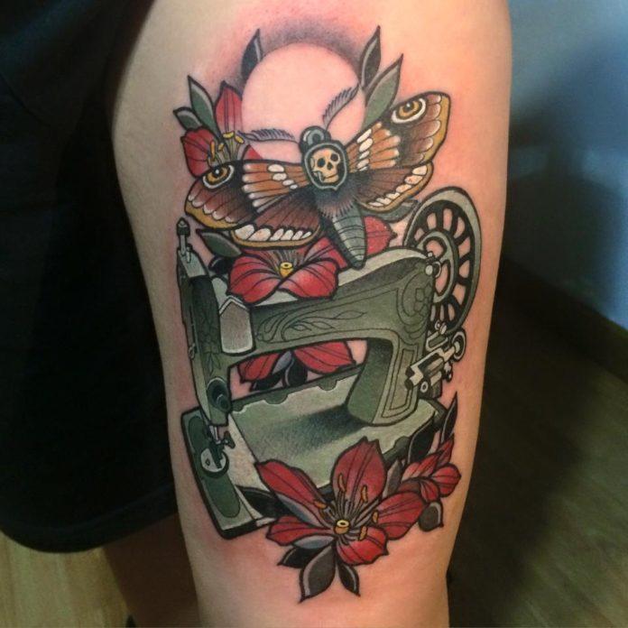 This neo traditional tattoo by Rodrigo Kalaka features a deaths head moth flying over an antique sewing machine.