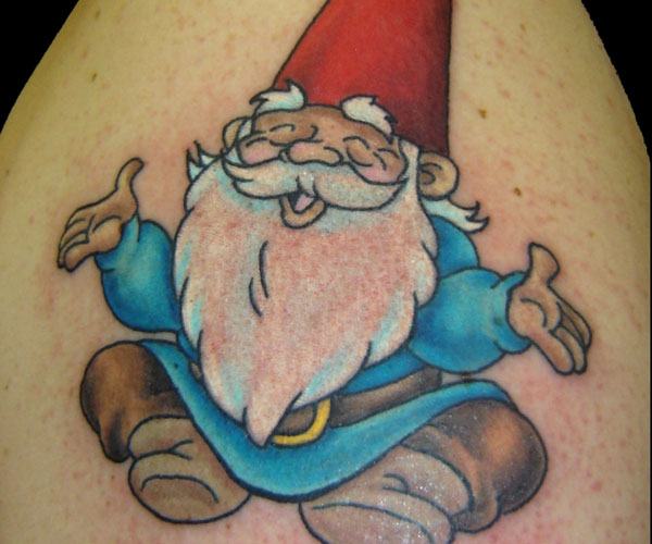 Gnomes are naturally happy creatures, as seen in this happy tattoo of a laughing gnome