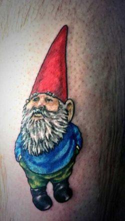 This colorful tattoo shows David the Gnome in his red hat and blue jacket