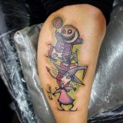 This cute tattoo By Karla Del Rio shows three evil but cute cartoon characters from Tim Burton's world