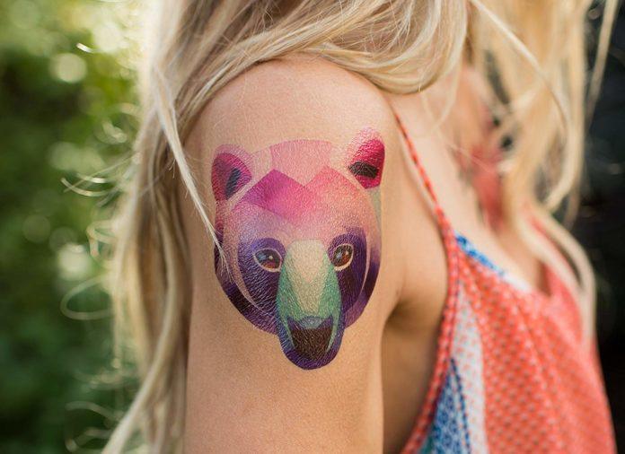 Colorful temporary tattoos like this watercolor bear by Sasha Unisex are an elegant and fun summer fashion statement