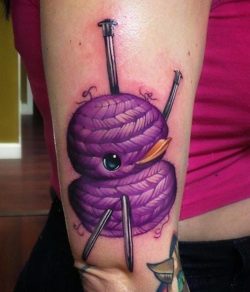 This cute tattoo of a knitted ducky toy is by the master of cute and colorful tattoos Steven Compton