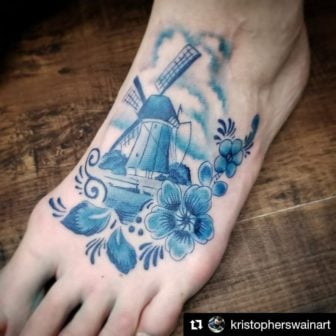 Tattooer Christopher Swain has used cobalt blue color tattoo ink to create this traditional Delft Blue porcelain painting tattoo